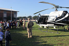  Students looking at a police helicopter